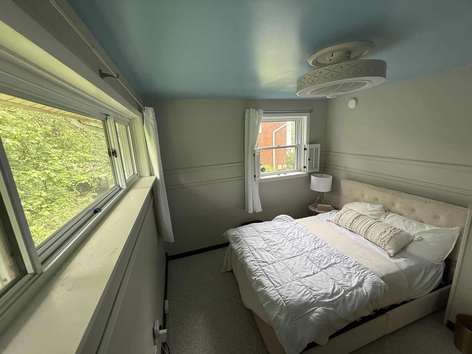 Second bedroom with Eight Sleep temperature-controlled bed and blackout curtains