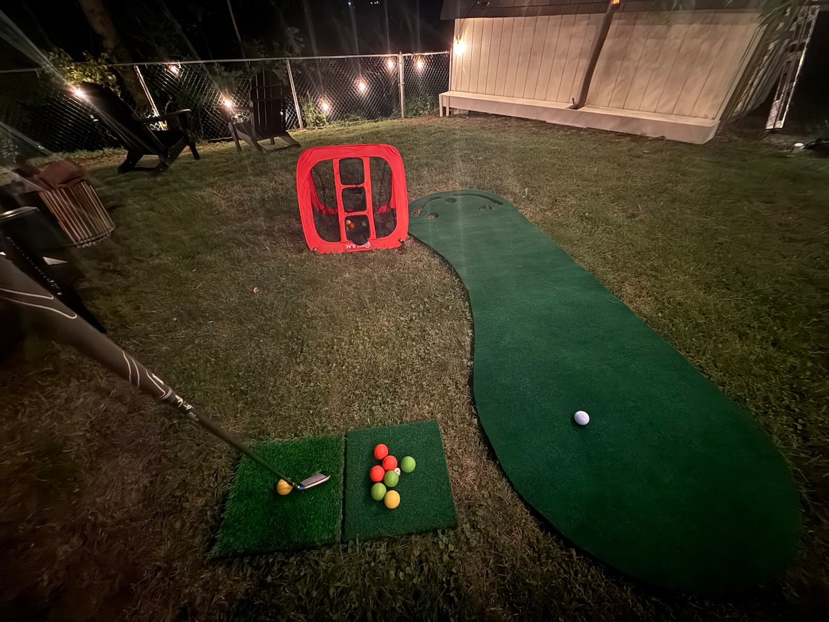 Putting mat and chipping golf set in the backyard — Urban Spa Retreat